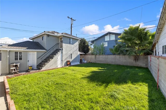 a house view with a garden space