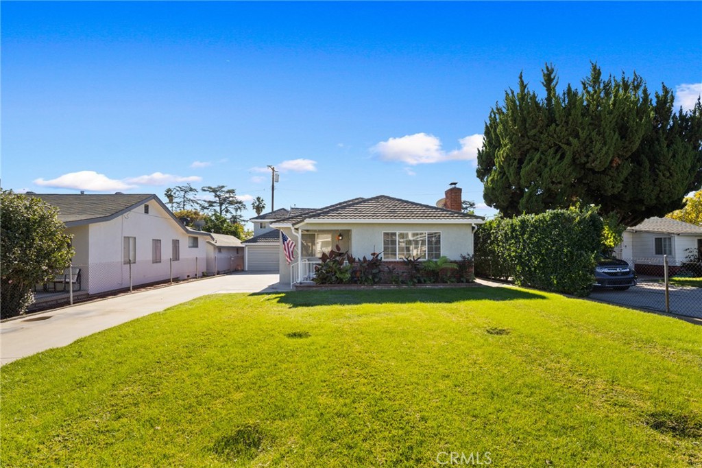 3920 Elma Road Pasadena, CA 91107 - Photo 3 of 29 a front view of a house with yard and swimming pool