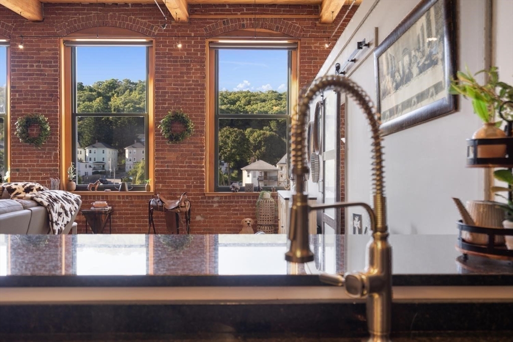 1 Envelope Terrace, Unit 302 Worcester, MA 01604 - Photo 16 of 42 a view of entryway and hall with wooden floor