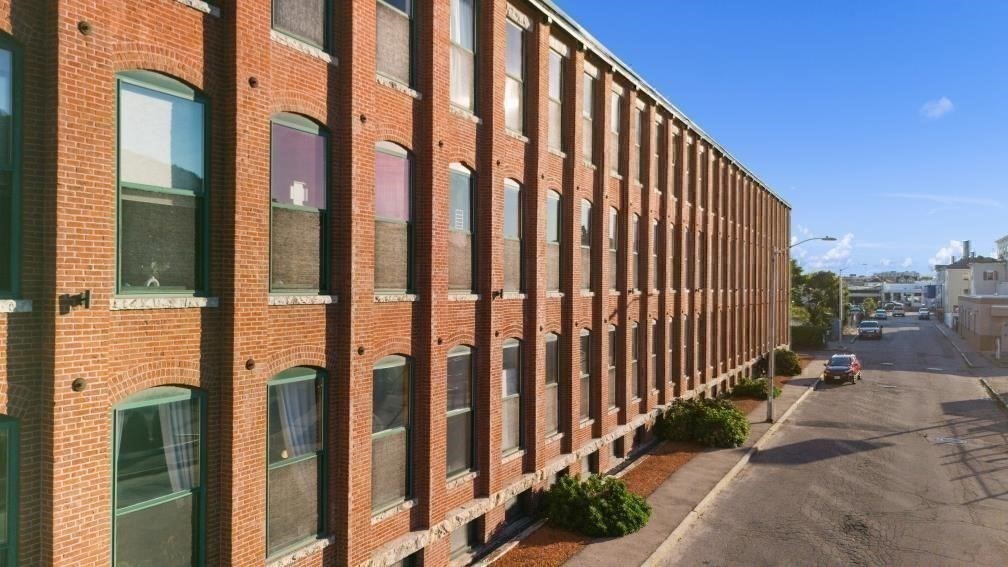 1 Envelope Terrace, Unit 302 Worcester, MA 01604 - Photo 38 of 42 a view of a building from a balcony