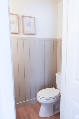 1204 North 3020th Street West Provo, UT 84601 - Photo 23 of 35 Interior powder room featuring board and batten wainscoting, light wood-finish flooring, and white walls
