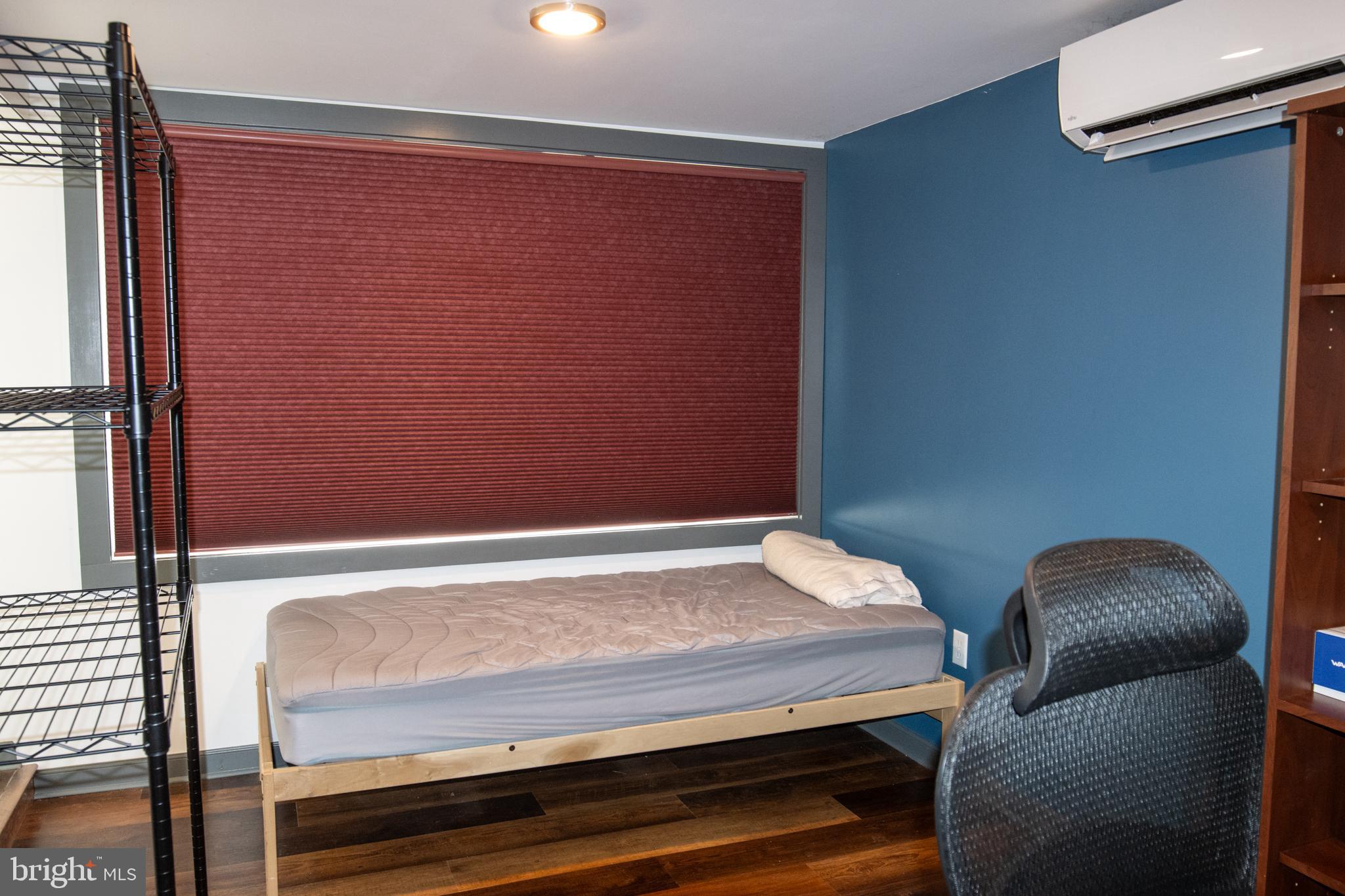 2130 East Main Street Valley View, PA 17983 - Photo 18 of 40 a view of room with window and wooden floor