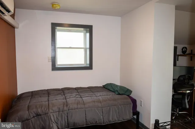 a view of a big room with windows