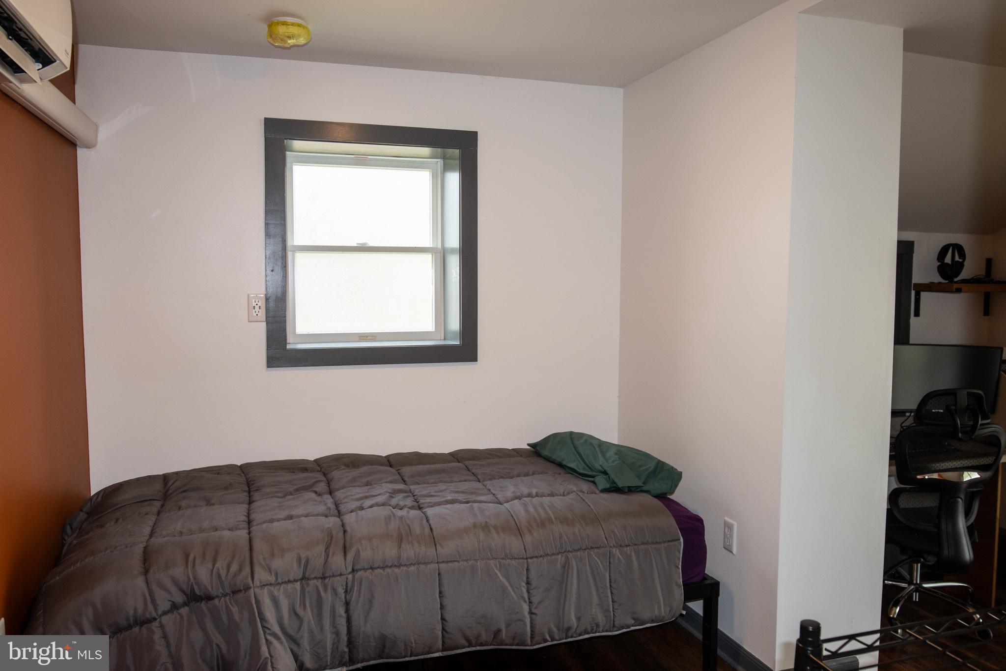 2130 East Main Street Valley View, PA 17983 - Photo 23 of 40 a bedroom with a bed and a window