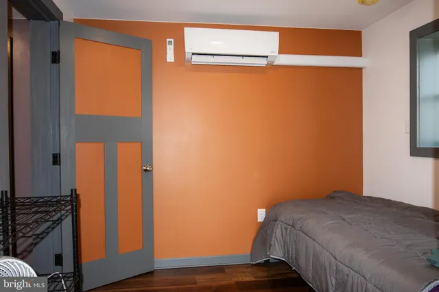 a view of empty room with wooden ceiling
