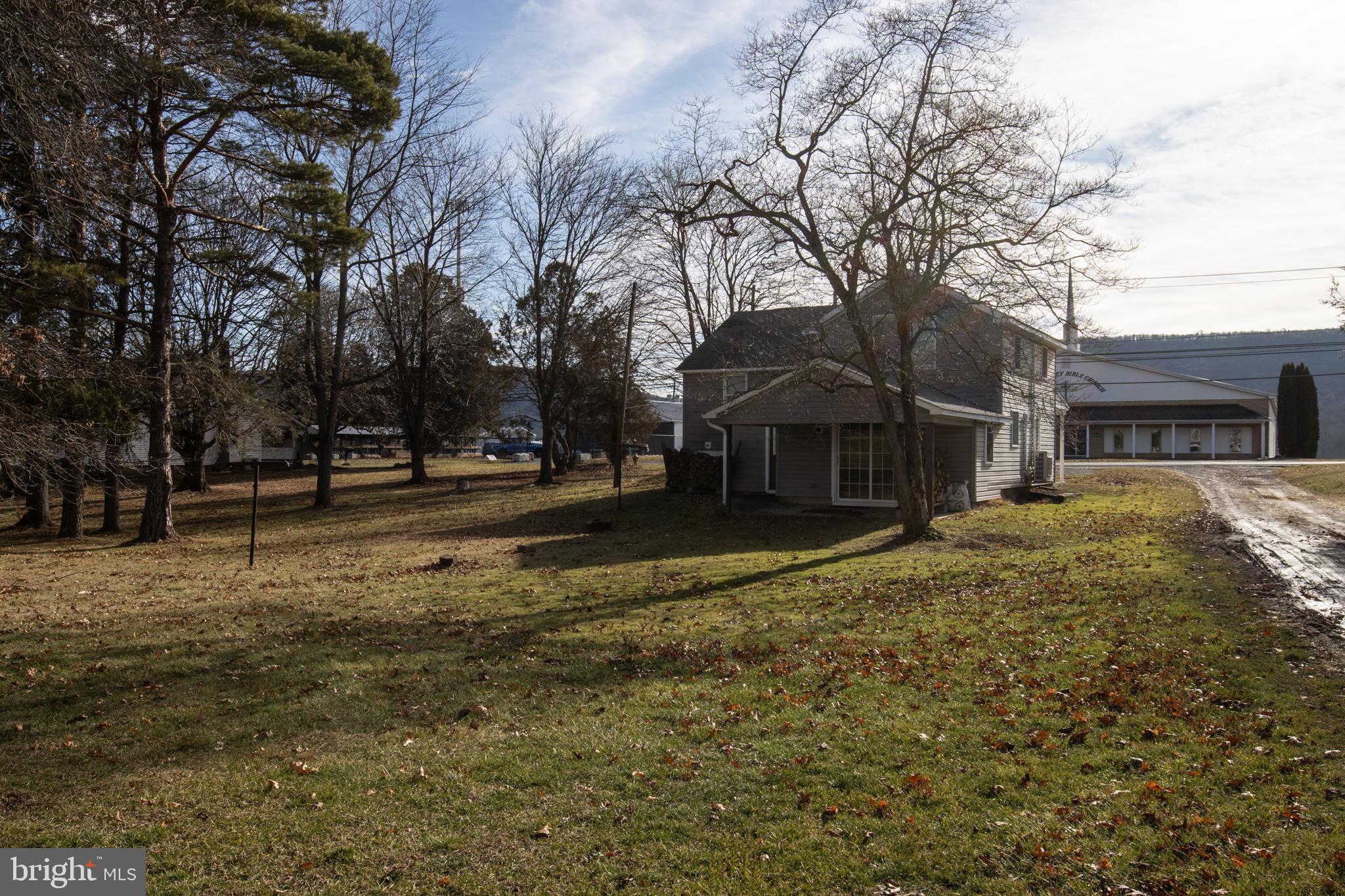 2130 East Main Street Valley View, PA 17983 - Photo 34 of 40 a house with trees in front of it