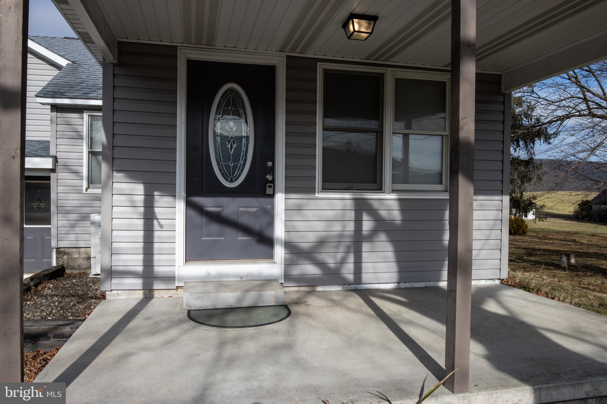 2130 East Main Street Valley View, PA 17983 - Photo 4 of 40 a front view of a house with a garden