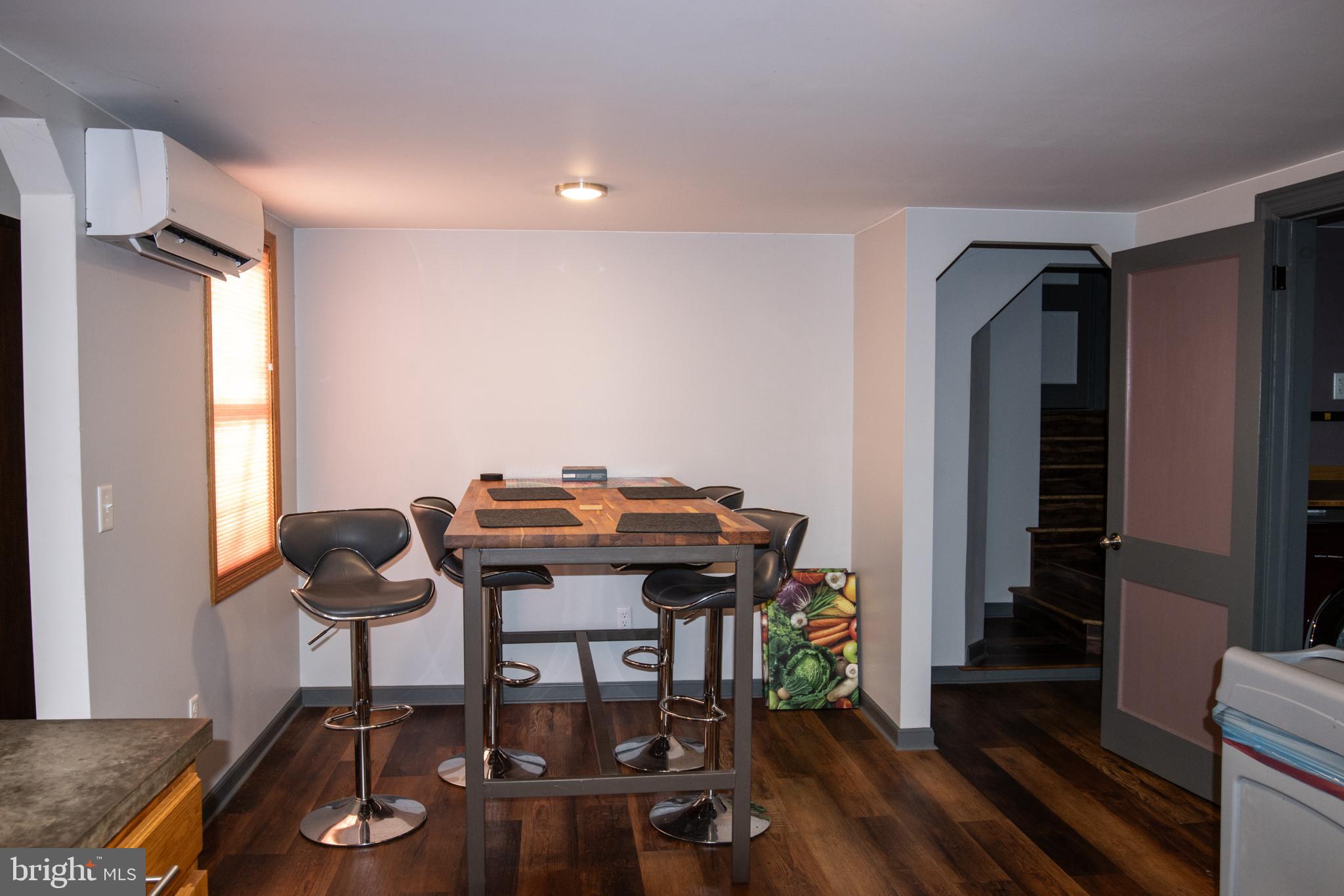 2130 East Main Street Valley View, PA 17983 - Photo 8 of 40 a view of a workspace with furniture and wooden floor