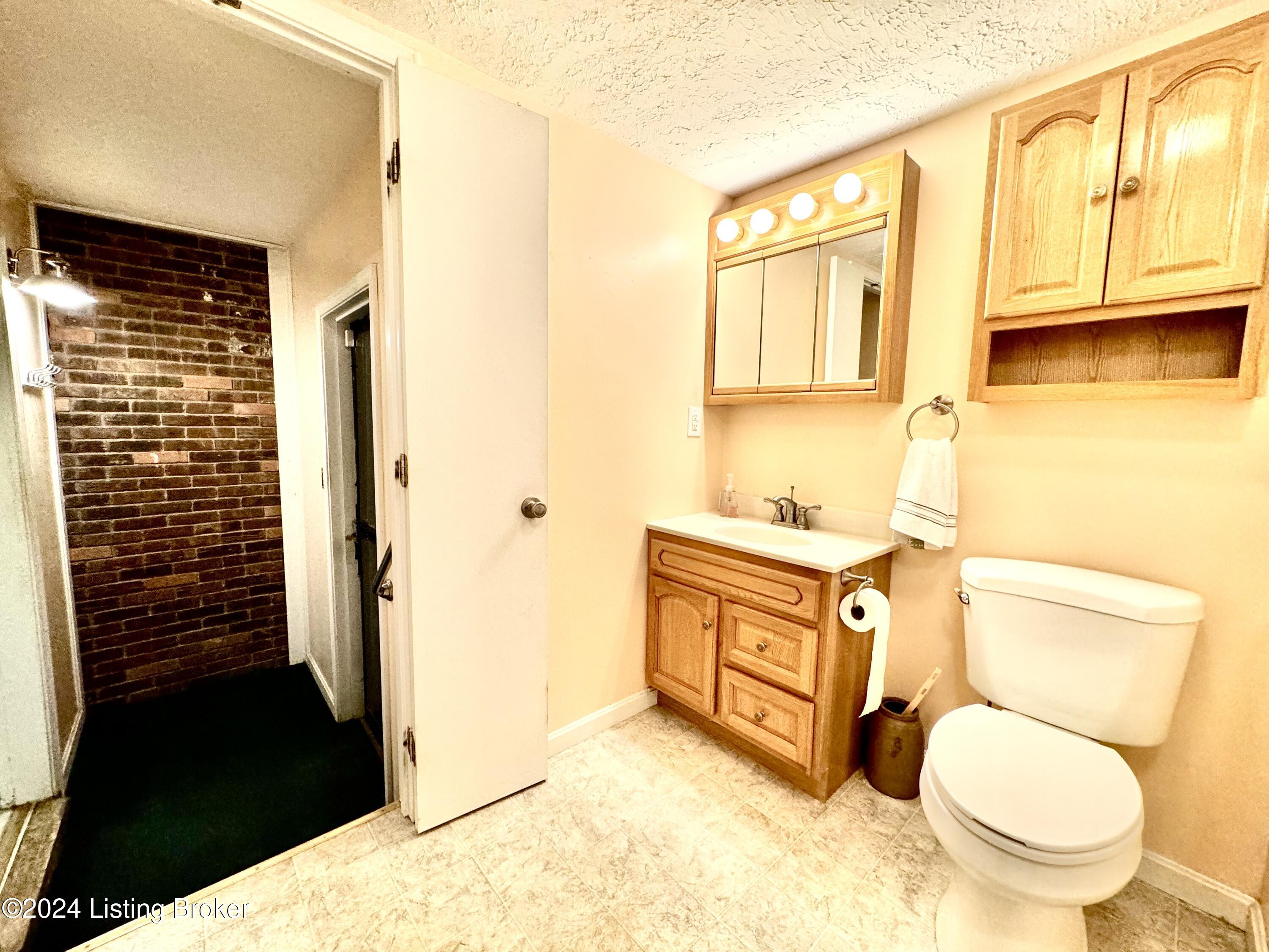 1184 Brooks Hill Road Brooks, KY 40109 - Photo 48 of 98 Mud room, bathroom and laundry. Located right off the attached garage entry.