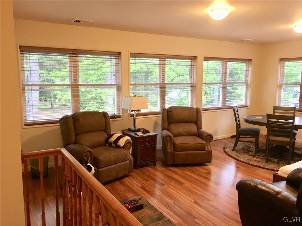 82 Waldheim Park Allentown, PA 18103 - Photo 13 of 22 a living room with furniture and a large window
