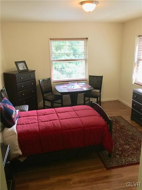 82 Waldheim Park Allentown, PA 18103 - Photo 14 of 22 a bedroom with a bed and a window