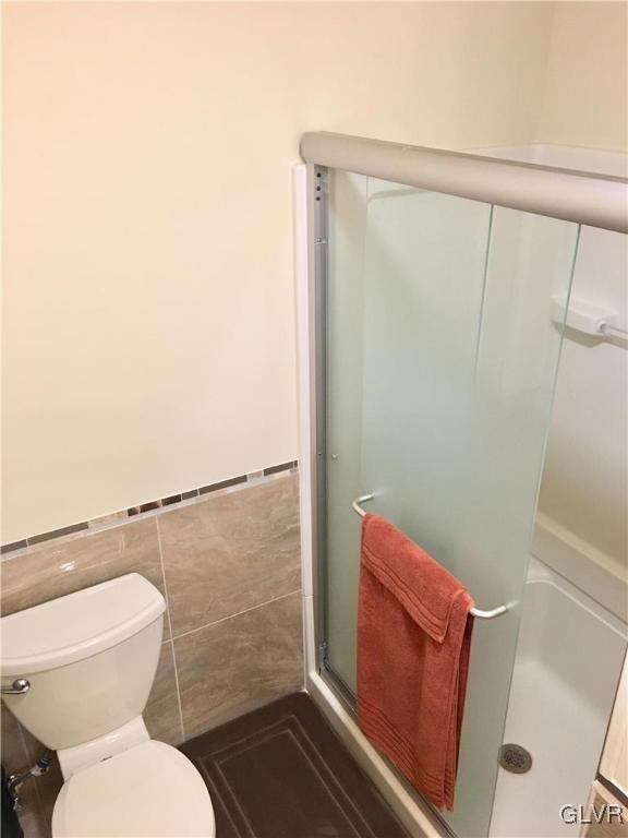 82 Waldheim Park Allentown, PA 18103 - Photo 17 of 22 a bathroom with a toilet and a shower