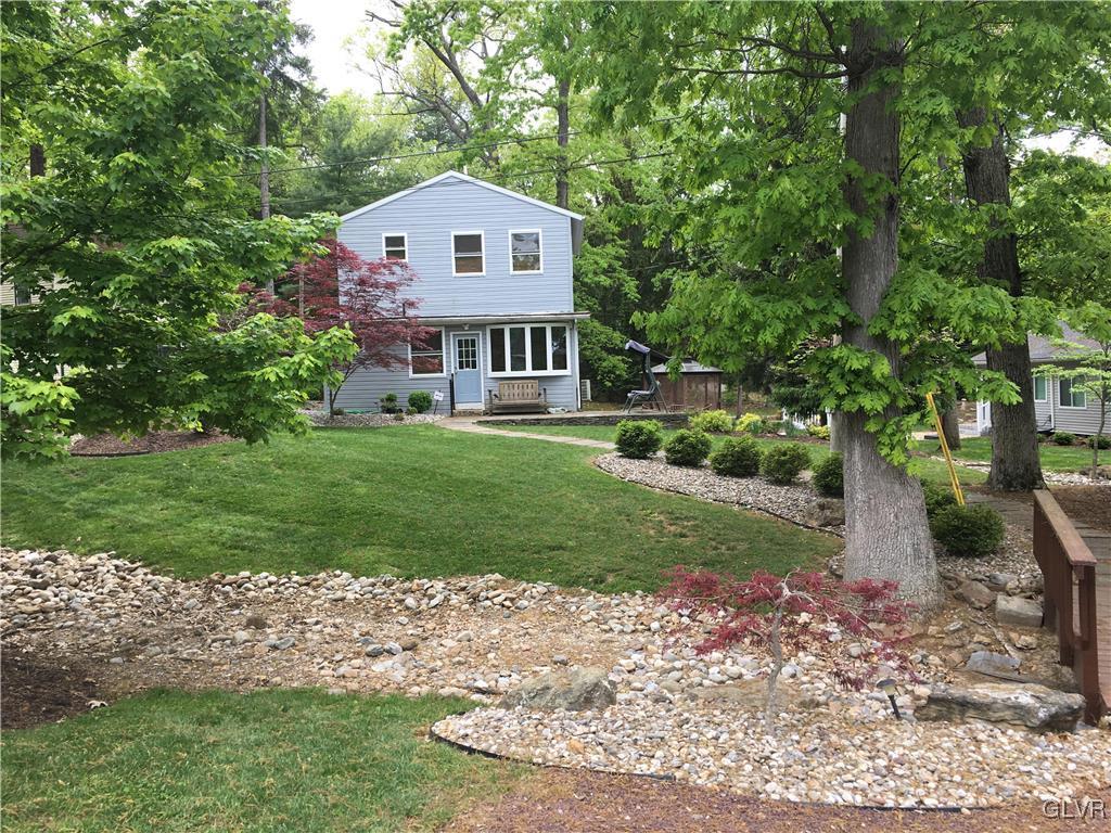 82 Waldheim Park Allentown, PA 18103 - Photo 2 of 22 a front view of a house with a yard