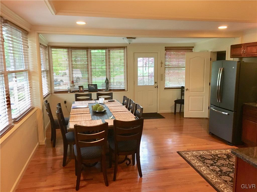 82 Waldheim Park Allentown, PA 18103 - Photo 6 of 22 a view of a dining room with furniture window and wooden floor