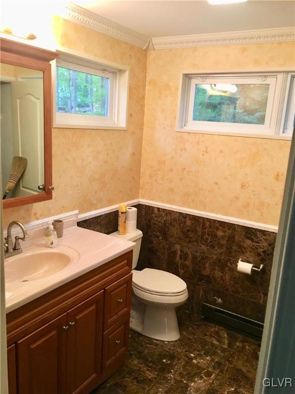 82 Waldheim Park Allentown, PA 18103 - Photo 9 of 22 a bathroom with a sink and a toilet