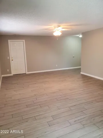 a view of an empty room and window