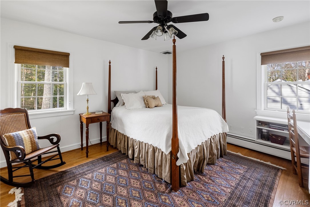 214 Ralston Road Henrico, VA 23229 - Photo 25 of 41 a bedroom with a bed chairs and a window