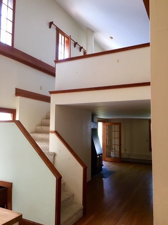 1470 Main Road Westport, MA 02790 - Photo 12 of 17 a view of entryway and hall with wooden floor