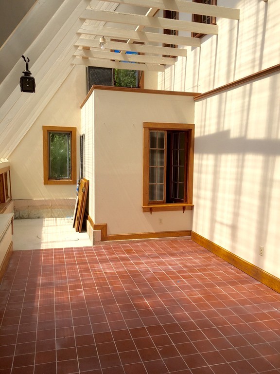 1470 Main Road Westport, MA 02790 - Photo 13 of 17 a view of an empty room with a window