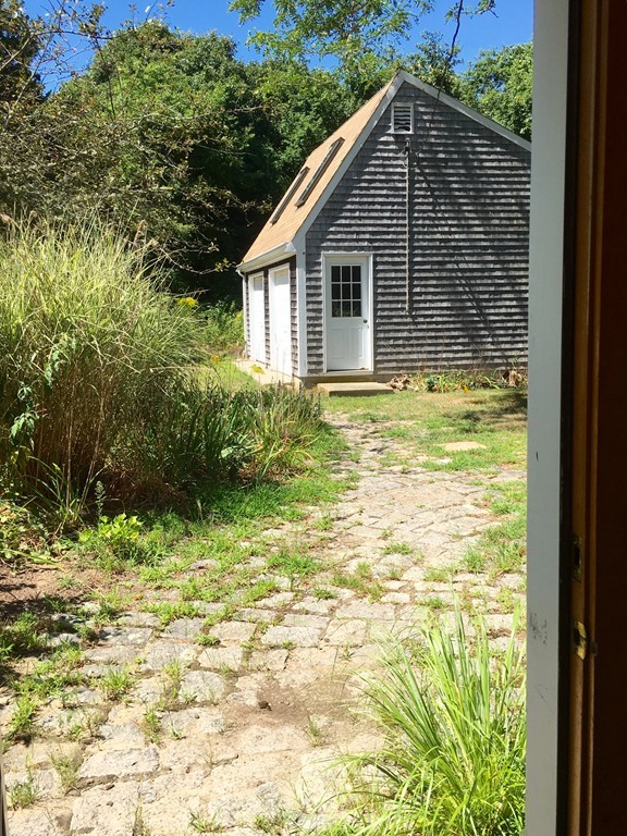 1470 Main Road Westport, MA 02790 - Photo 3 of 17 a backyard of a house