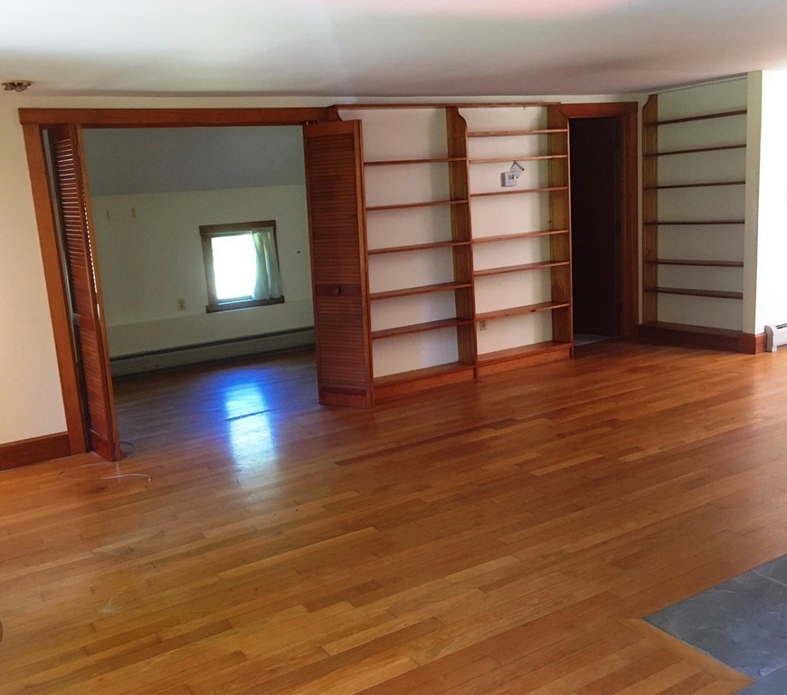 1470 Main Road Westport, MA 02790 - Photo 7 of 17 a view of a room with wooden floor and closet
