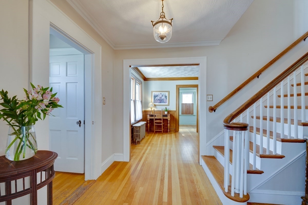 97 Standish Road Watertown, MA 02472 - Photo 4 of 30 a very nice looking room with wooden floor and furniture