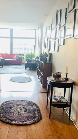 a living room with a rug