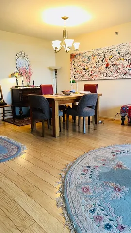 a view of a swimming pool with furniture