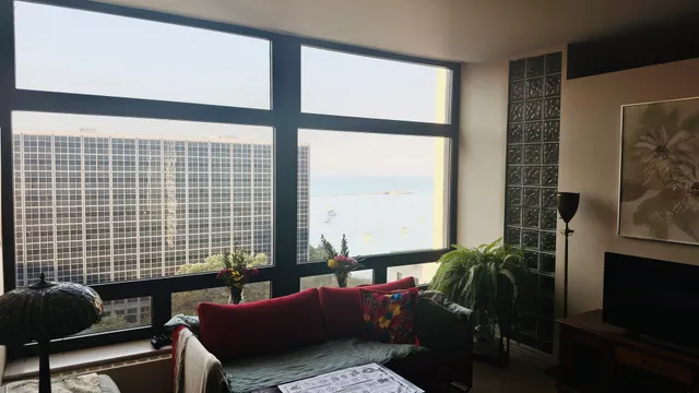 a living room with furniture and a window