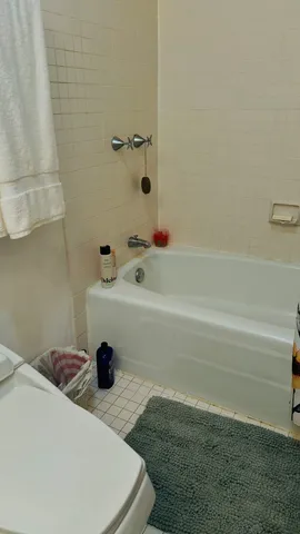 a bathroom with a sink and a bathtub