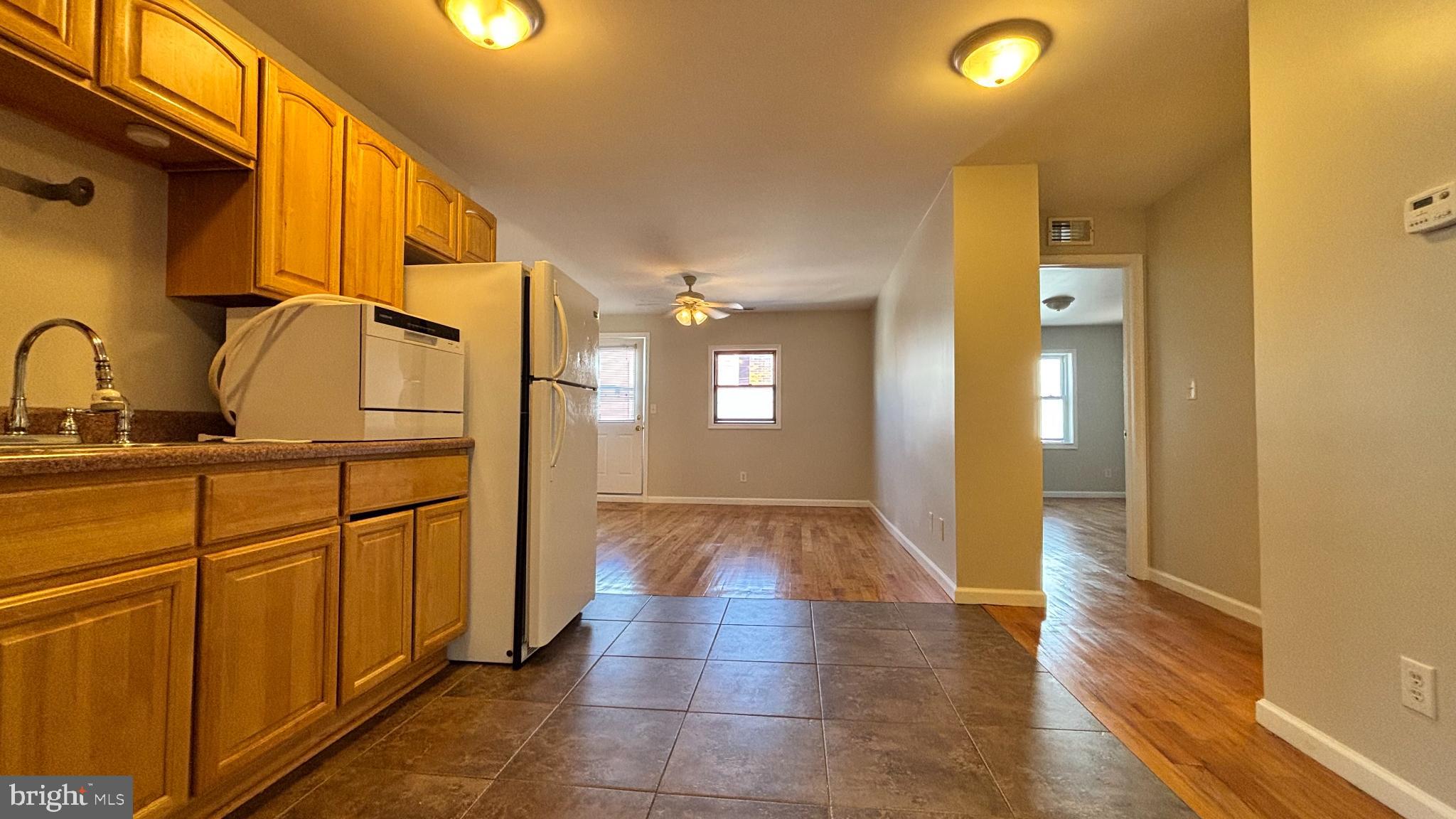 1925 South Bancroft Street Philadelphia, PA 19145 - Photo 4 of 12 a bathroom with mirror on vanity and a shower