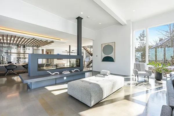 a bathroom with a sink a toilet and a shower curtain