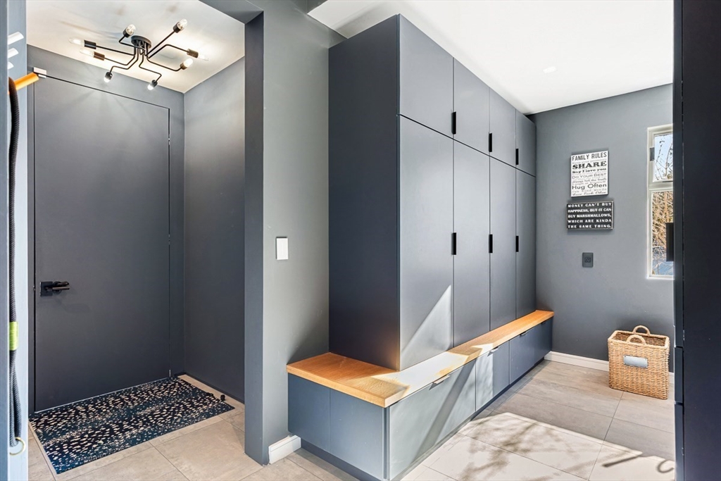 85 Forbes Road Milton, MA 02186 - Photo 17 of 39 a very nice looking room with an entryway