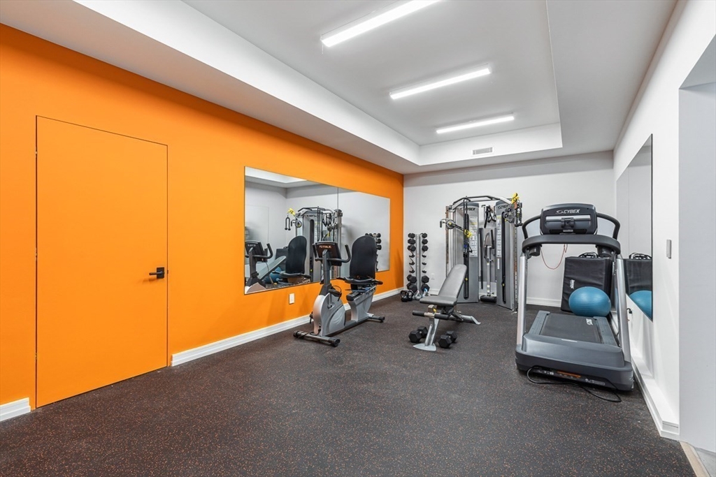 85 Forbes Road Milton, MA 02186 - Photo 23 of 39 a view of a room with gym equipment
