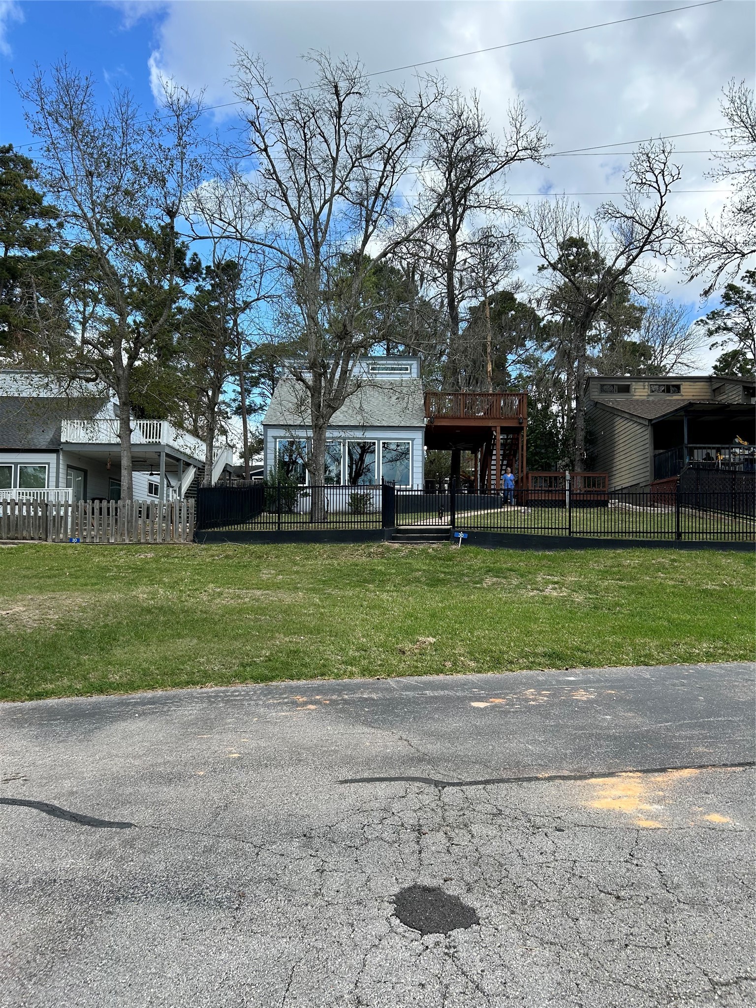 30 Harbour Lane Coldspring, TX 77331 - Photo 30 of 31 a front view of house with yard and green space