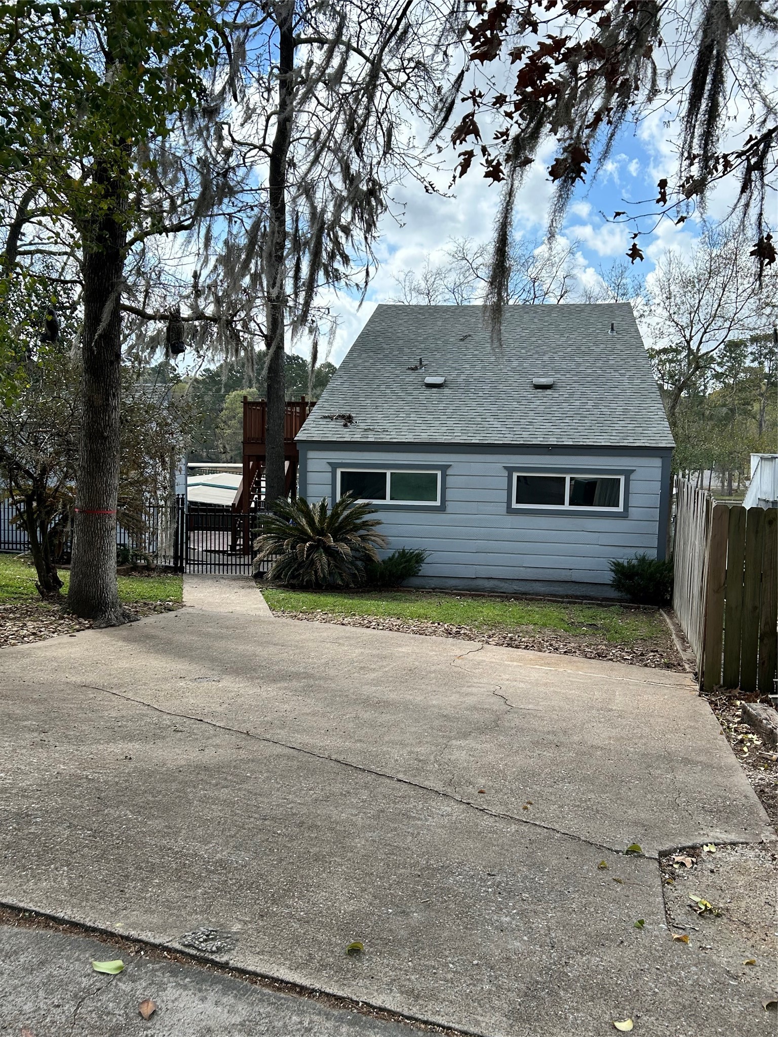 30 Harbour Lane Coldspring, TX 77331 - Photo 4 of 31 a front view of a house with a yard