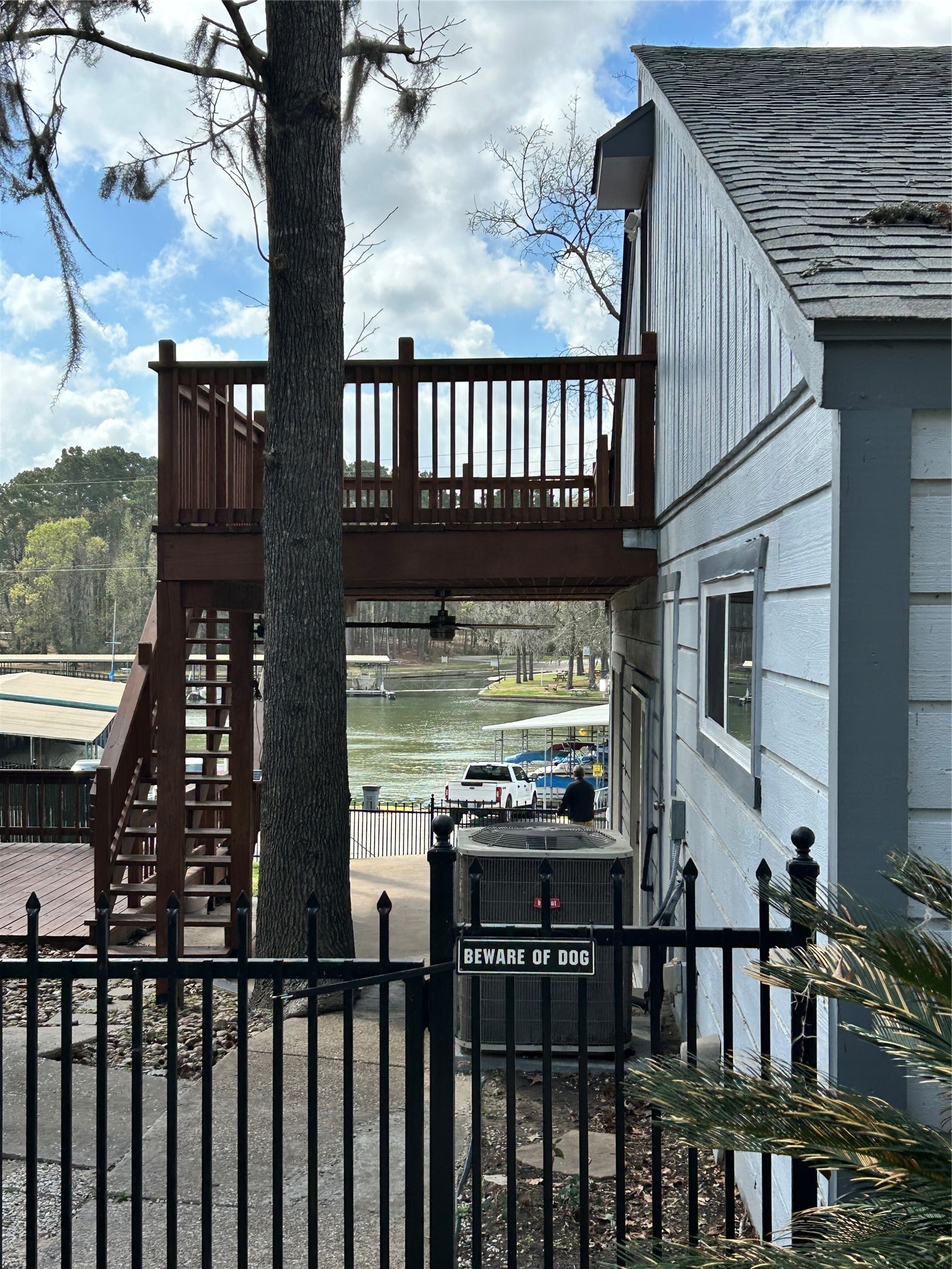 30 Harbour Lane Coldspring, TX 77331 - Photo 5 of 31 a view of a brick house with a large window