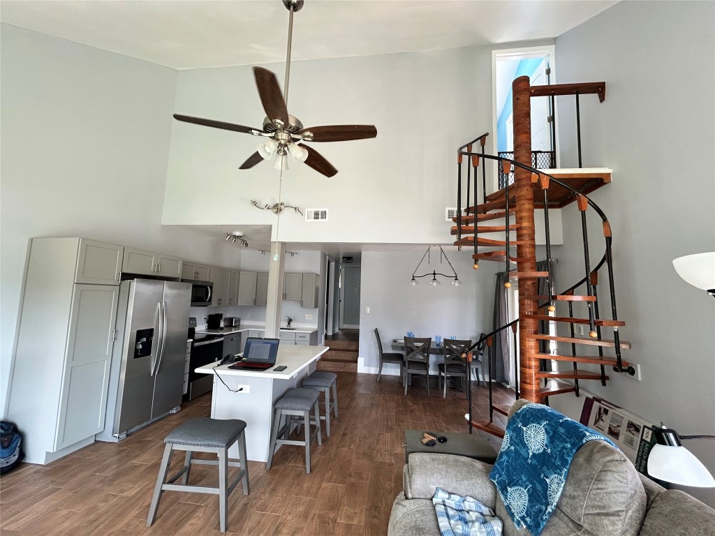30 Harbour Lane Coldspring, TX 77331 - Photo 7 of 31 a living room with furniture a rug and white walls