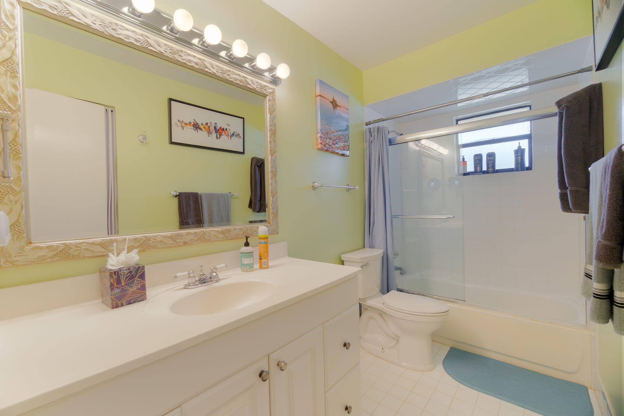 6130 Francis Street Jupiter, FL 33458 - Photo 11 of 27 a bathroom with a sink a toilet and shower