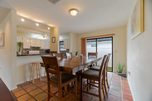a view of a dining room with furniture