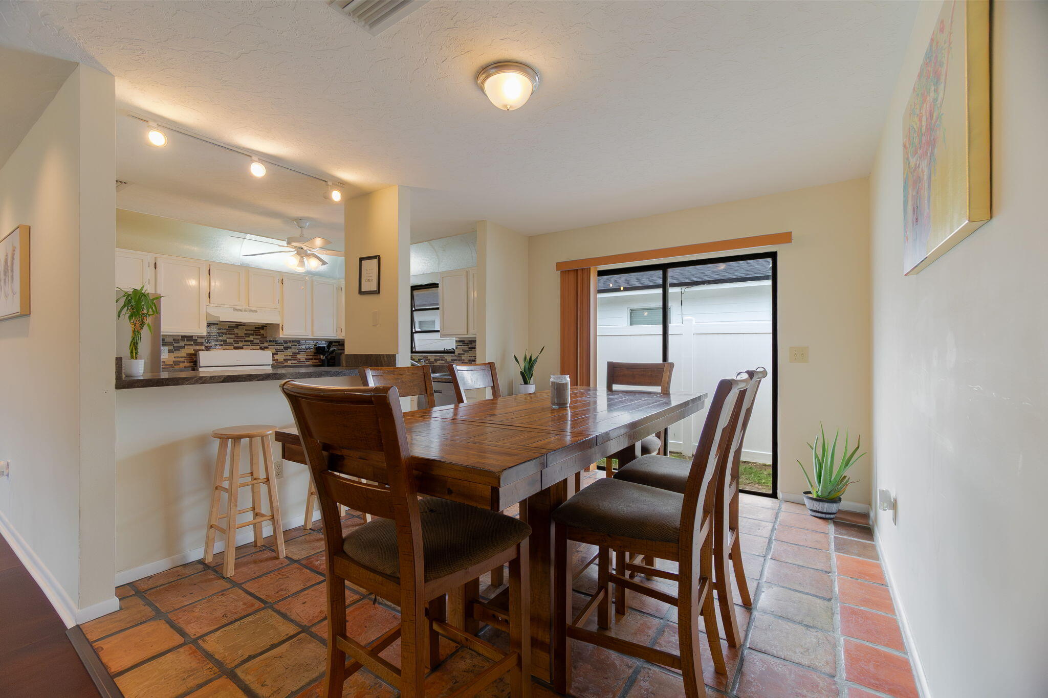6130 Francis Street Jupiter, FL 33458 - Photo 14 of 27 a view of a dining room with furniture