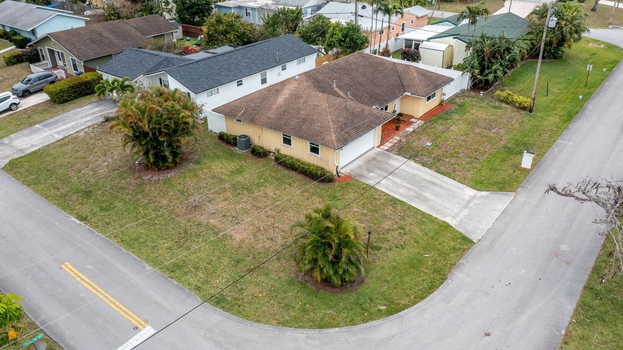 6130 Francis Street Jupiter, FL 33458 - Photo 23 of 27 a view of a swimming pool with a yard and plants