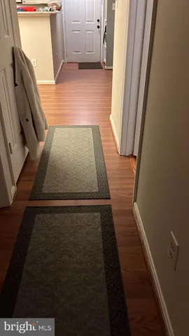 a view of hallway with a large window