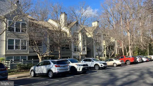 a view of a cars parked in front of a building
