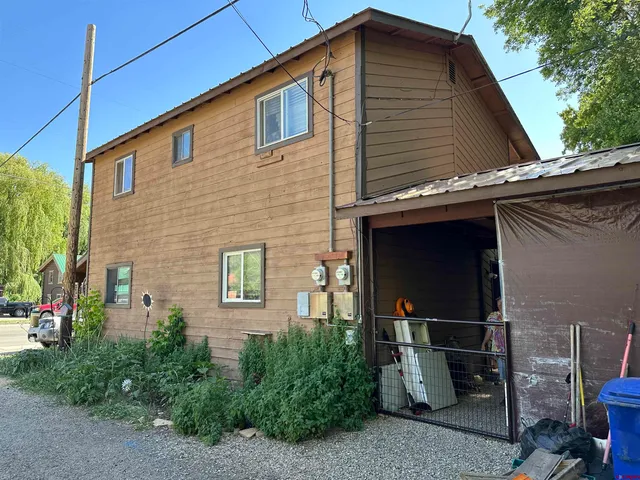 a front view of a house with patio