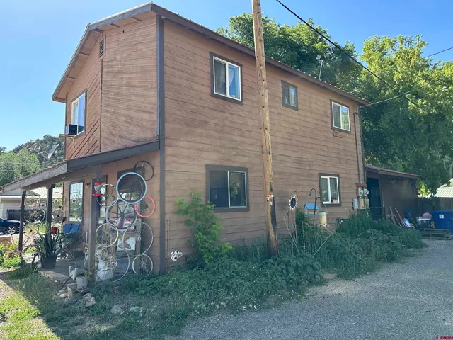 a front view of a house with balcony