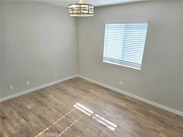 a view of a room that has a window in it