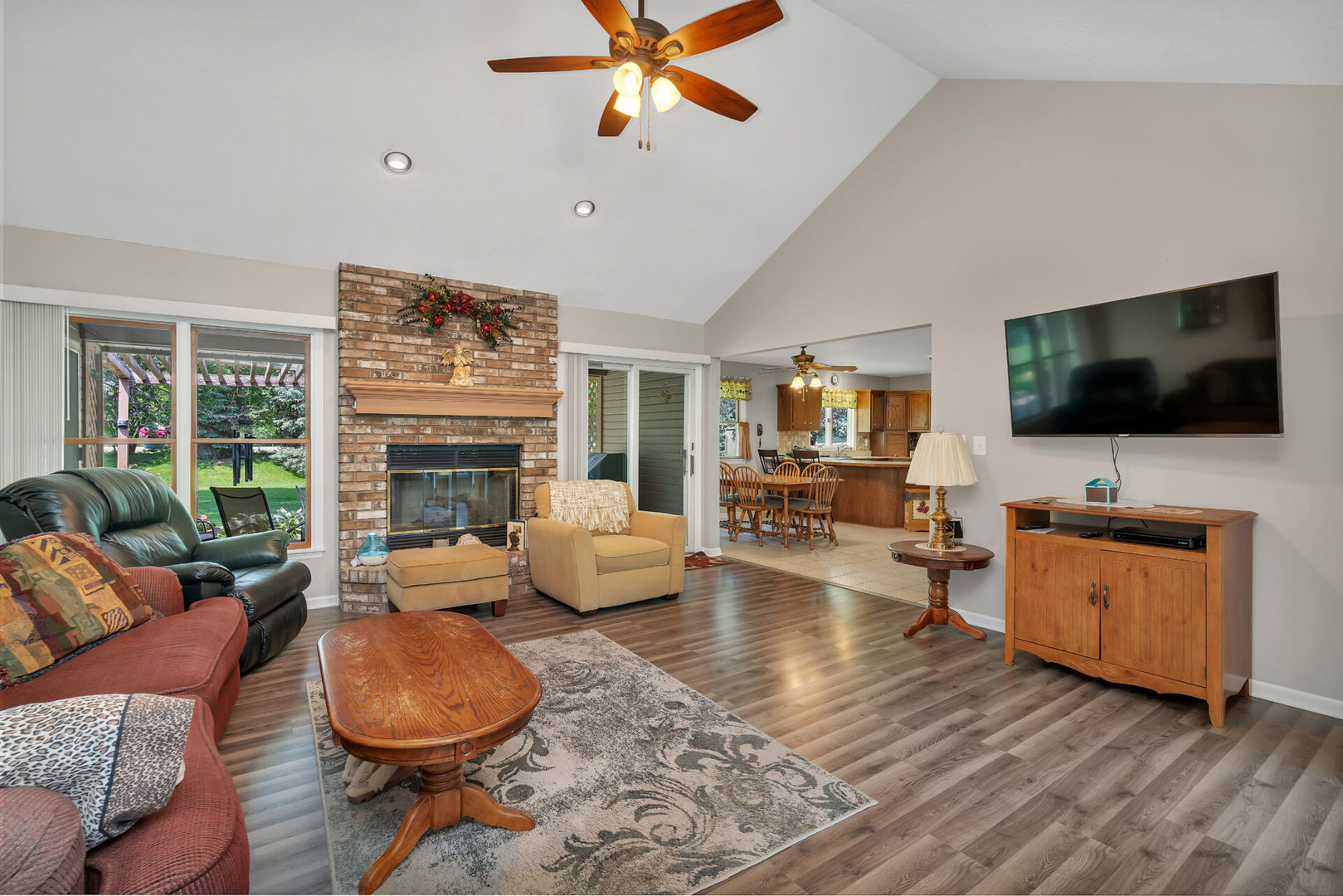 101 San Carlos Road Minooka, IL 60447 - Photo 3 of 15 a living room with furniture and a flat screen tv
