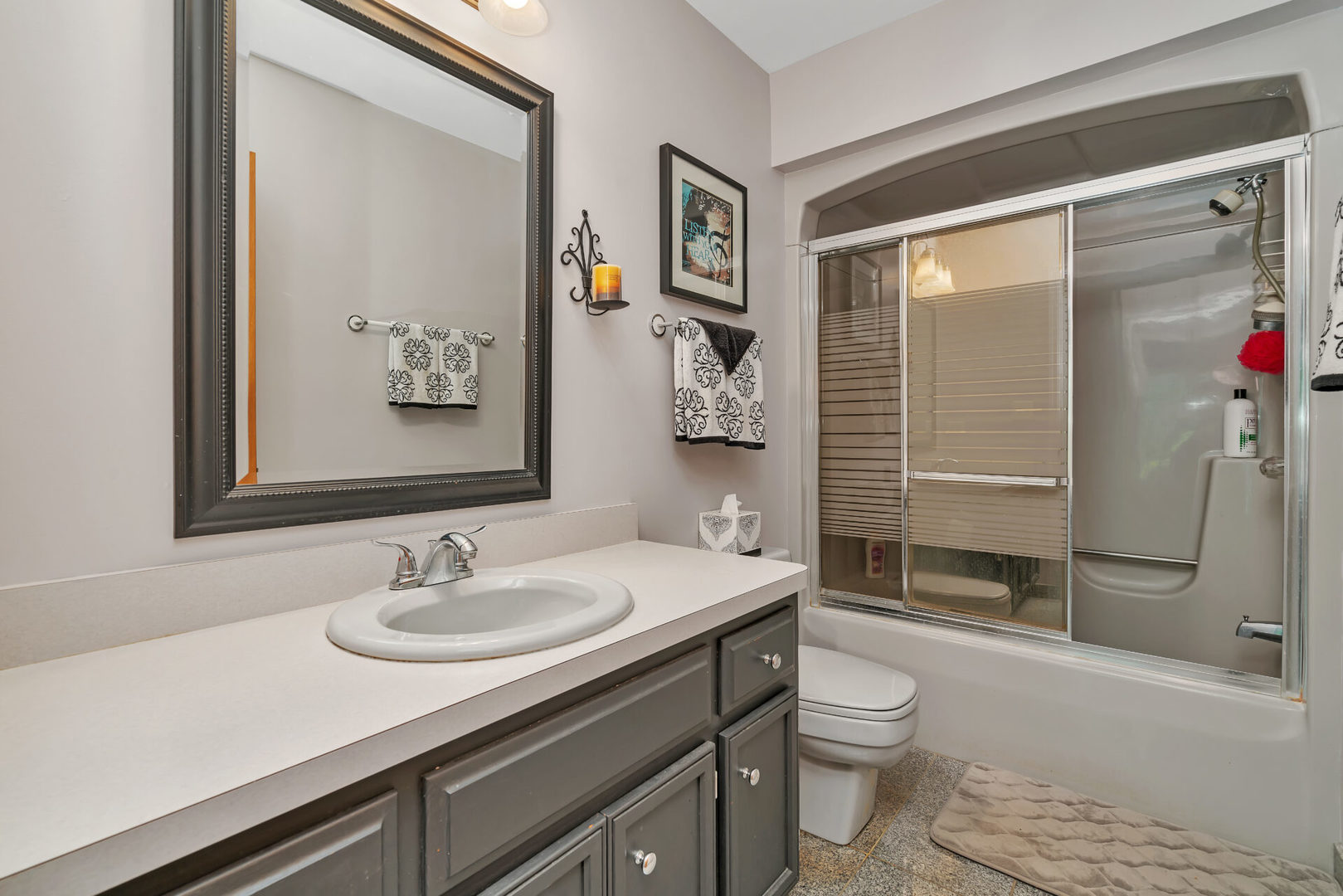 101 San Carlos Road Minooka, IL 60447 - Photo 9 of 15 a bathroom with a sink a toilet and shower