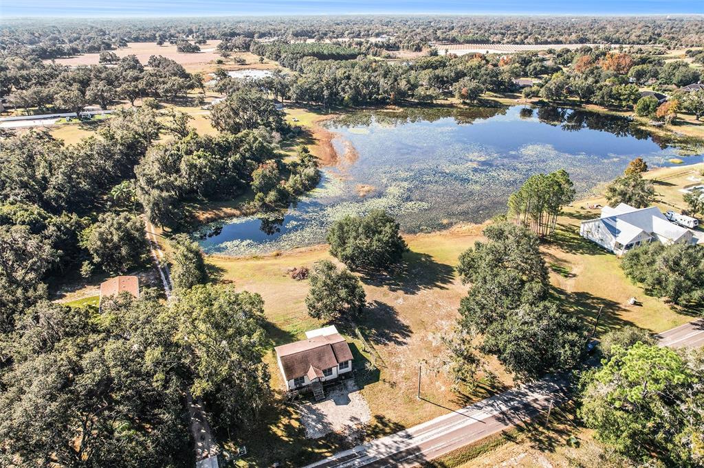 2215 Wallace Road Lutz, FL 33549 - Photo 14 of 15 an aerial view of residential houses with outdoor space